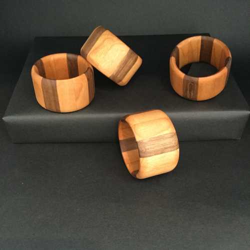 Four Walnut and Cherry Napkin Rings